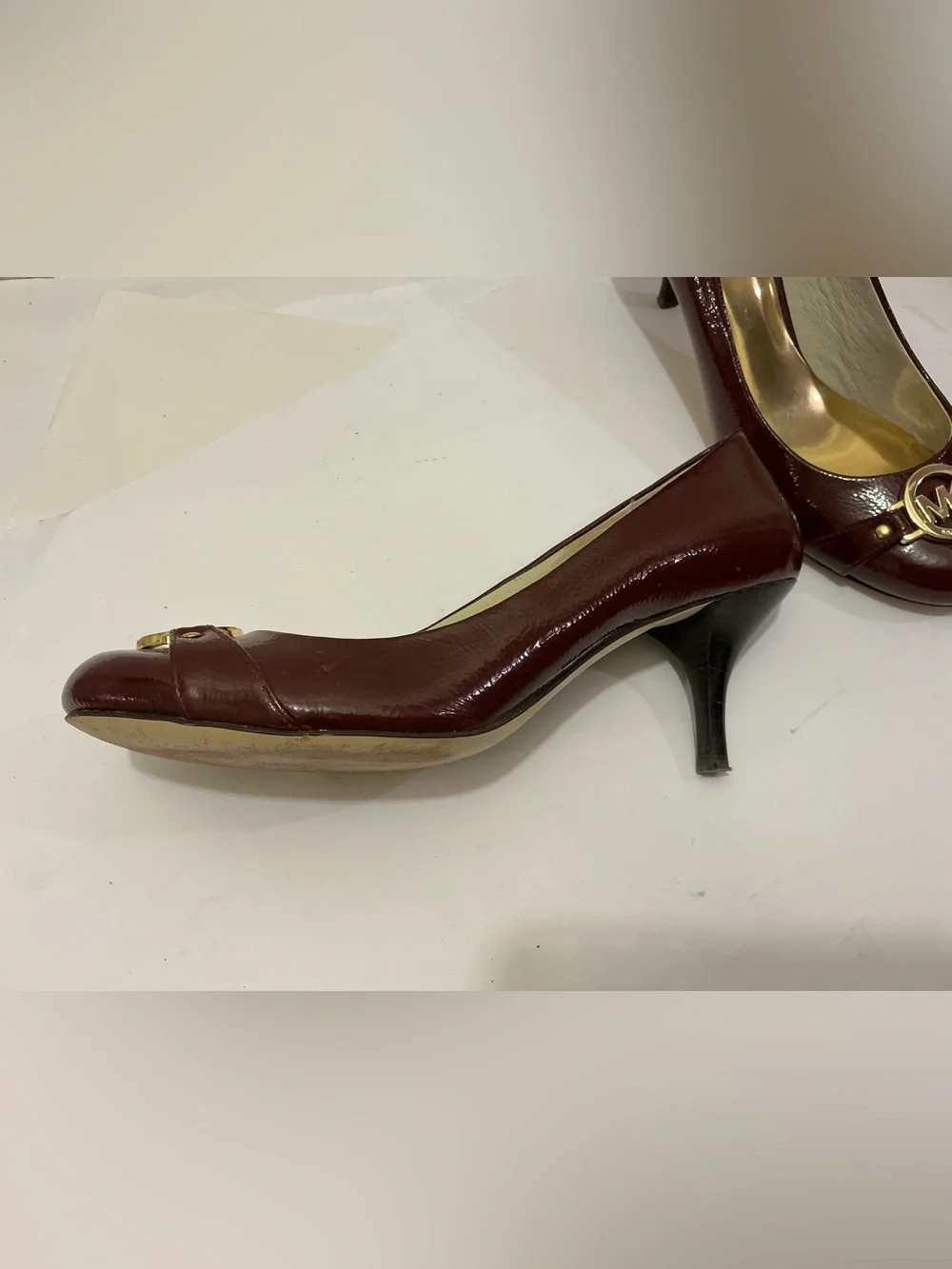 Michael Kors Burgundy Patent Leather Mid-Heel Pumps with Gold MK Emblem